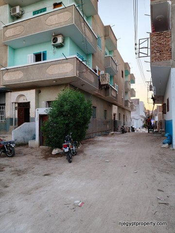 Amazing Residential Building with 4 Apartments and Rooftop for Sale in Luxor – Prime Main Road Frontage